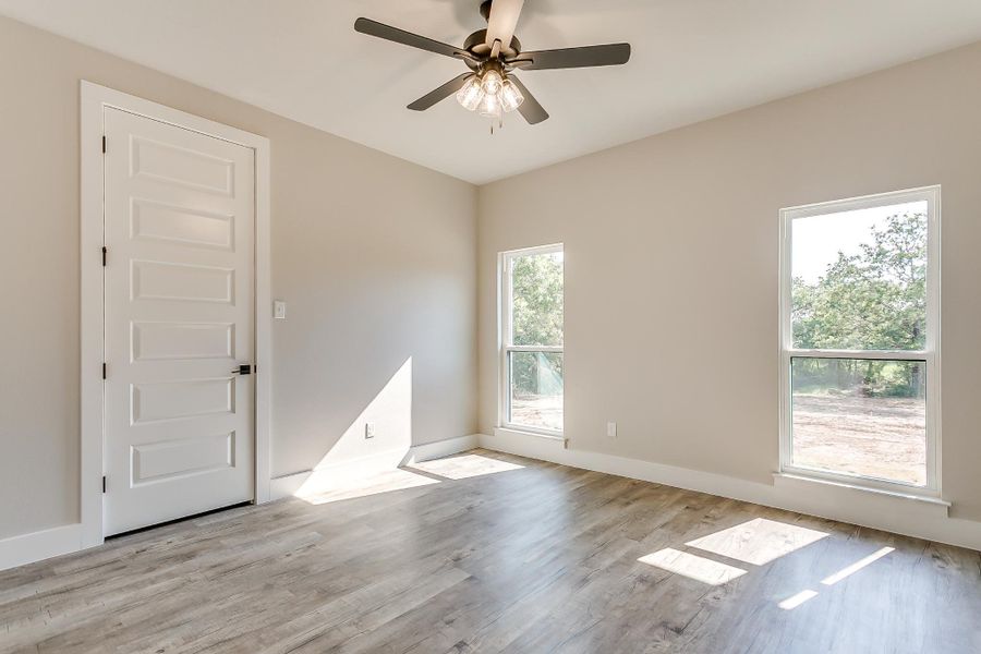 Representative unfurnished interior of a home built from the Refuge Lane by Trinity Classic Homes in Zion Trails, Poolville (Image 23).