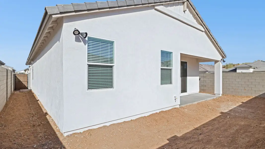 Exterior details and patio area of a home in The Ridge at Stone Butte, Phoenix (Image 3).
