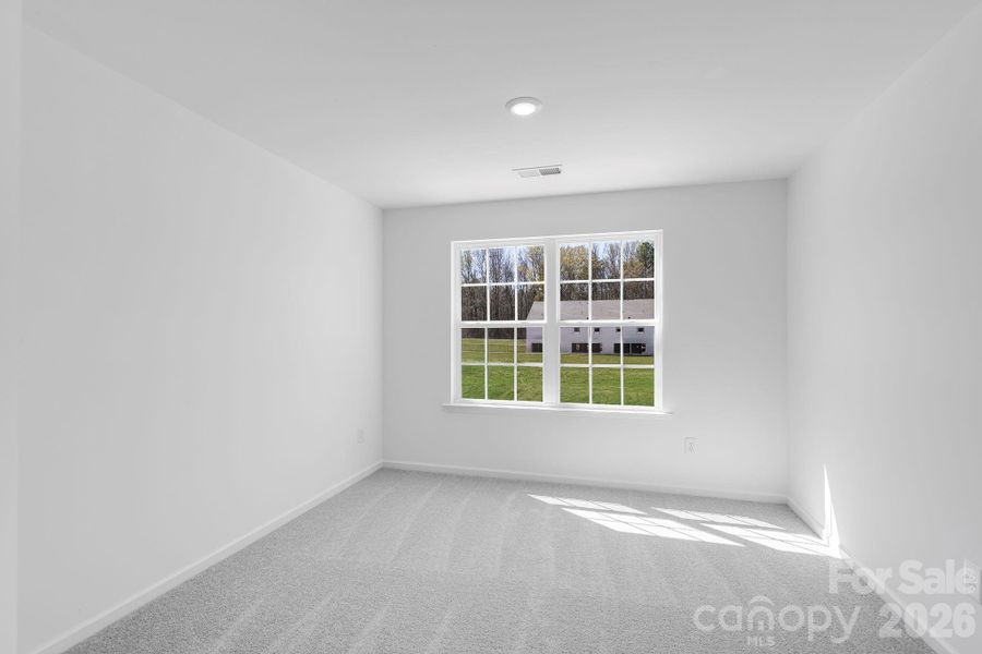 Spacious, unfurnished interior of a new home in Cannon Village, York (Image 11).