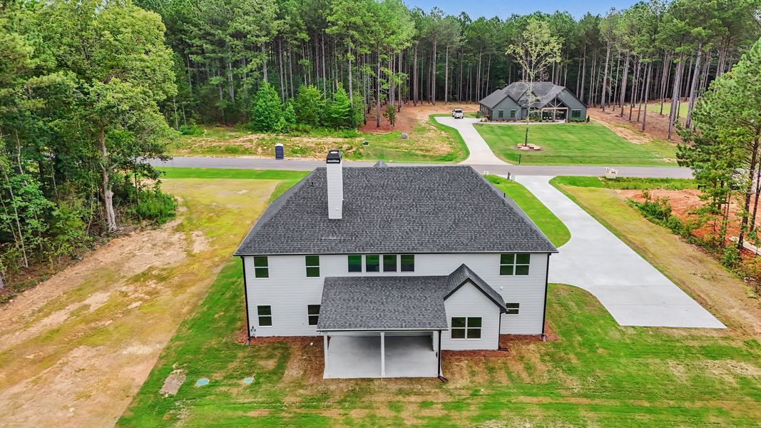 Front exterior of a new home in Flint Farms, Concord, GA, highlighting curb appeal (Image 28).