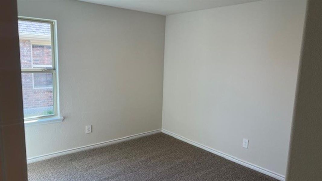 Unfurnished room featuring carpet and baseboards Unfurnished room featuring carpet and baseboards