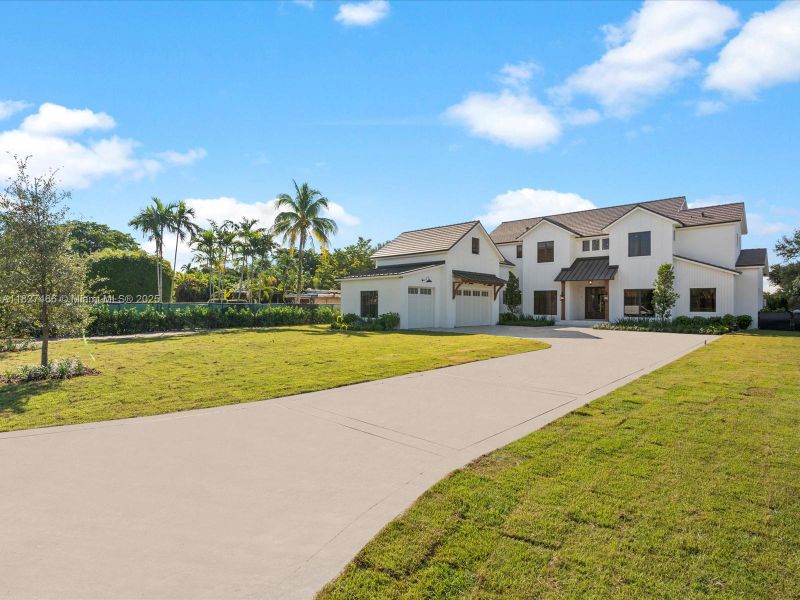 Front exterior of a new home in , Miami, FL, highlighting curb appeal (Image 26).
