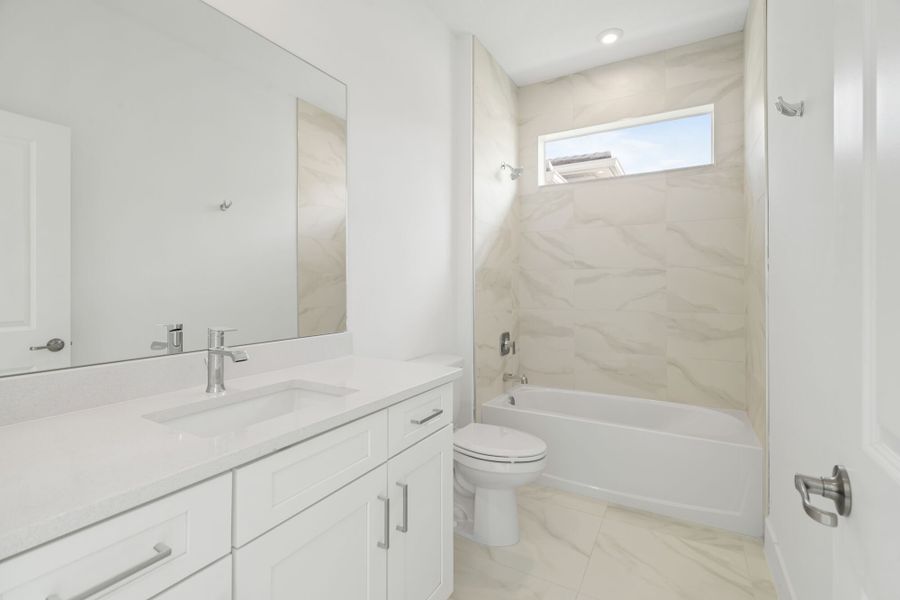 Representative furnished interior of a home built from the Eden Grand by Mattamy Homes in Tradition - Telaro, Port St. Lucie (Image 11). Representative furnished interior of a home built from the Eden Grand by Mattamy Homes in Tradition - Telaro, Port St. Lucie (Image 11).