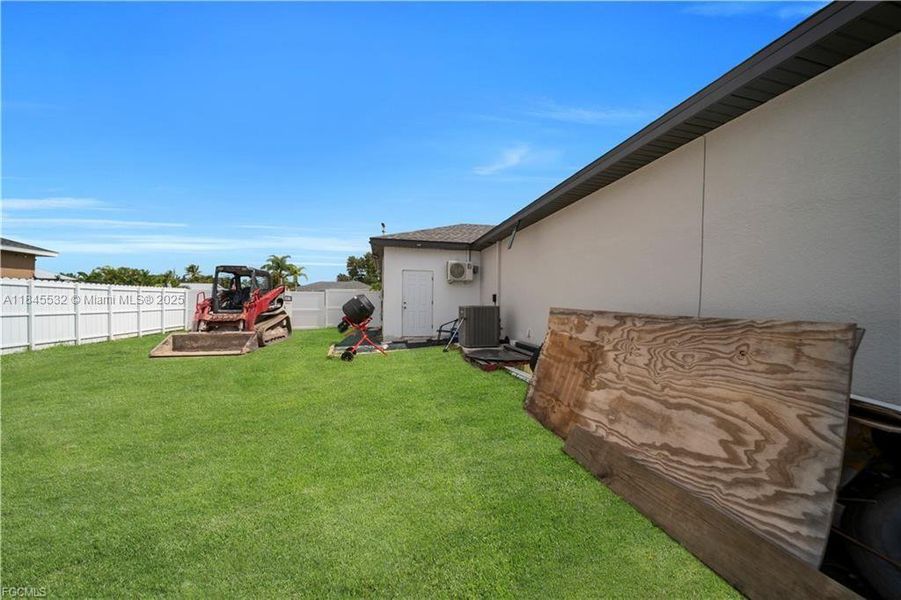 Front exterior of a new home in , Cape Coral, FL, highlighting curb appeal (Image 2). Front exterior of a new home in , Cape Coral, FL, highlighting curb appeal (Image 2).