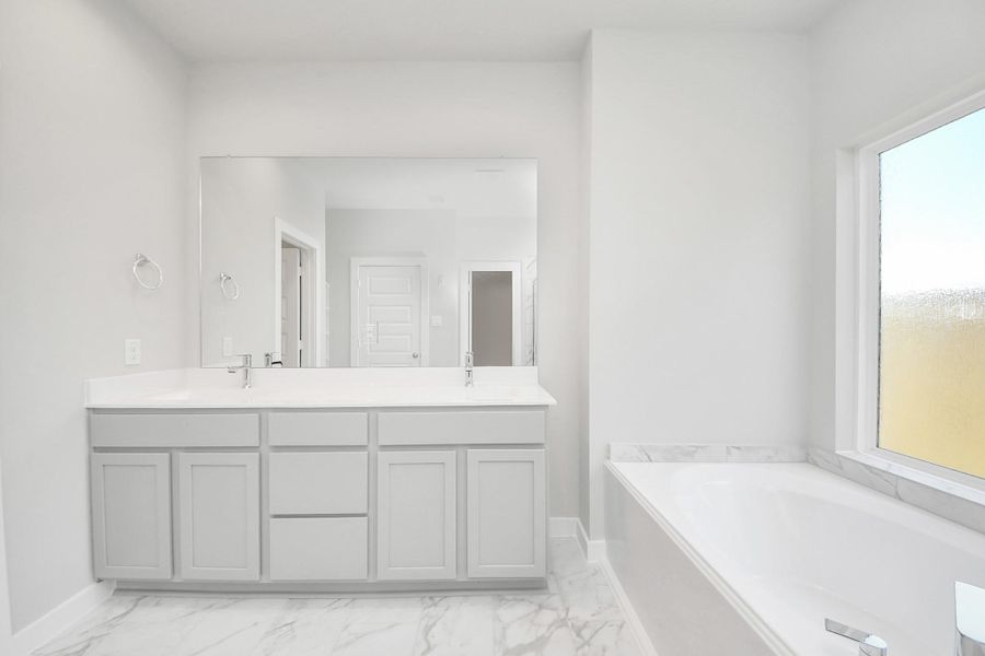 Sample photo of completed home with similar plan. Actual colors and selections may vary. Call for more info.