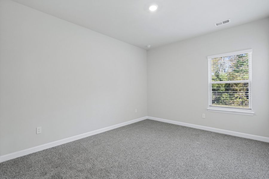 Spacious, unfurnished interior of a new home in Waterside - Coastline Series, Longs (Image 28).