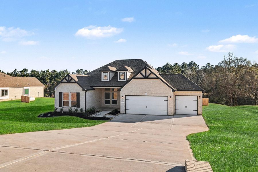 Front exterior of a new home in Rose Hill Estates, Willis, TX, highlighting curb appeal (Image 18).