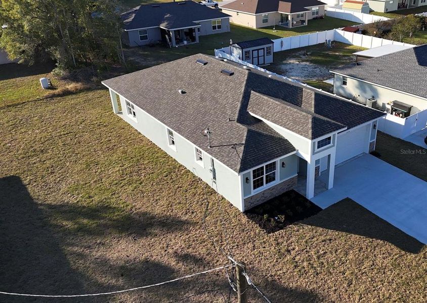 Exterior details and patio area of a home in , Summerfield (Image 29).