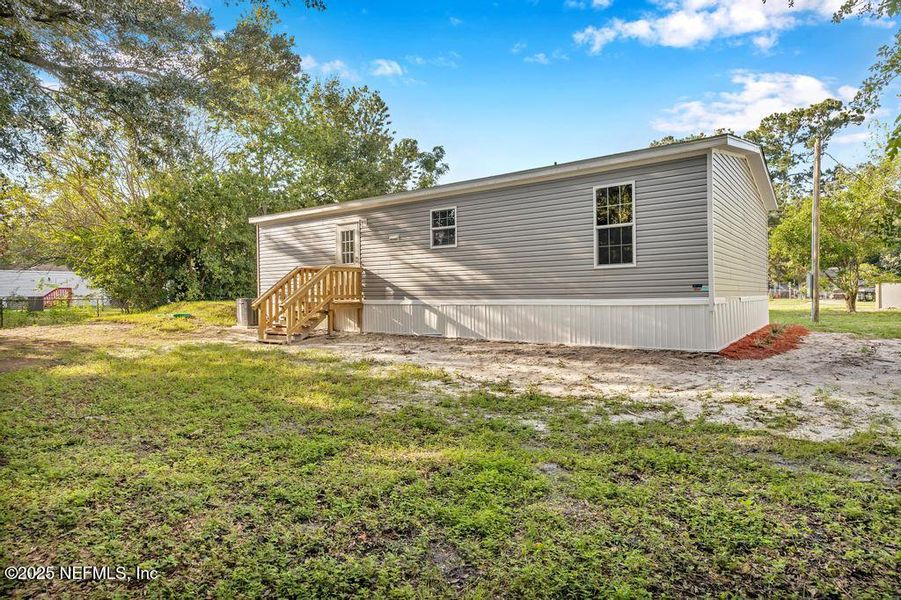 Exterior details and patio area of a home in , Jacksonville (Image 23). Exterior details and patio area of a home in , Jacksonville (Image 23).