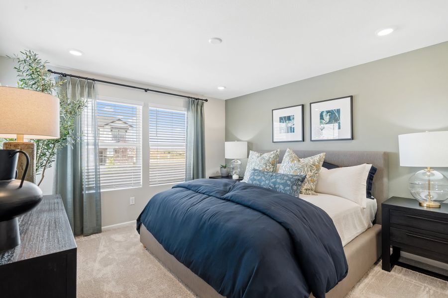 Representative furnished interior of a home built from the 2403 by Risewell Homes in Harvest Crossing, Aurora (Image 9).