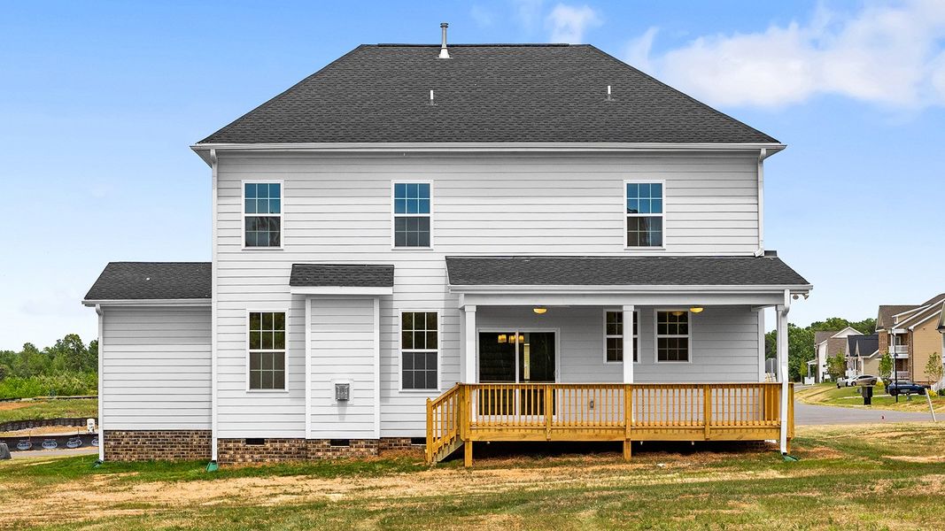 Exterior details and patio area of a home in Lilah Grove, Summerfield (Image 26).