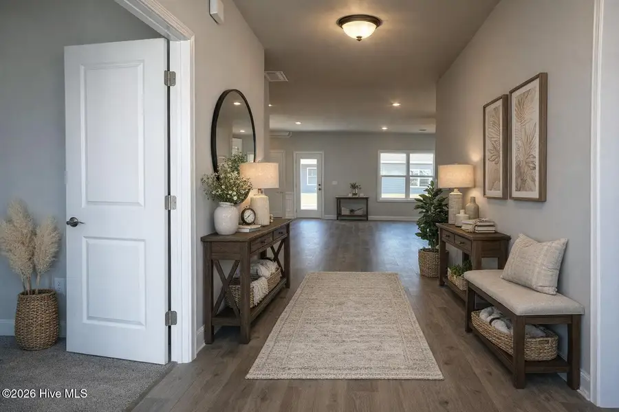 Furnished interior view inside a new home in Wood Creek Landing, Leland (Image 3).