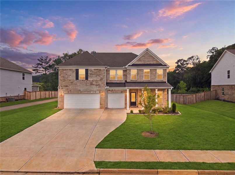 Front exterior of a new home in , McDonough, GA, highlighting curb appeal (Image 2). Front exterior of a new home in , McDonough, GA, highlighting curb appeal (Image 2).