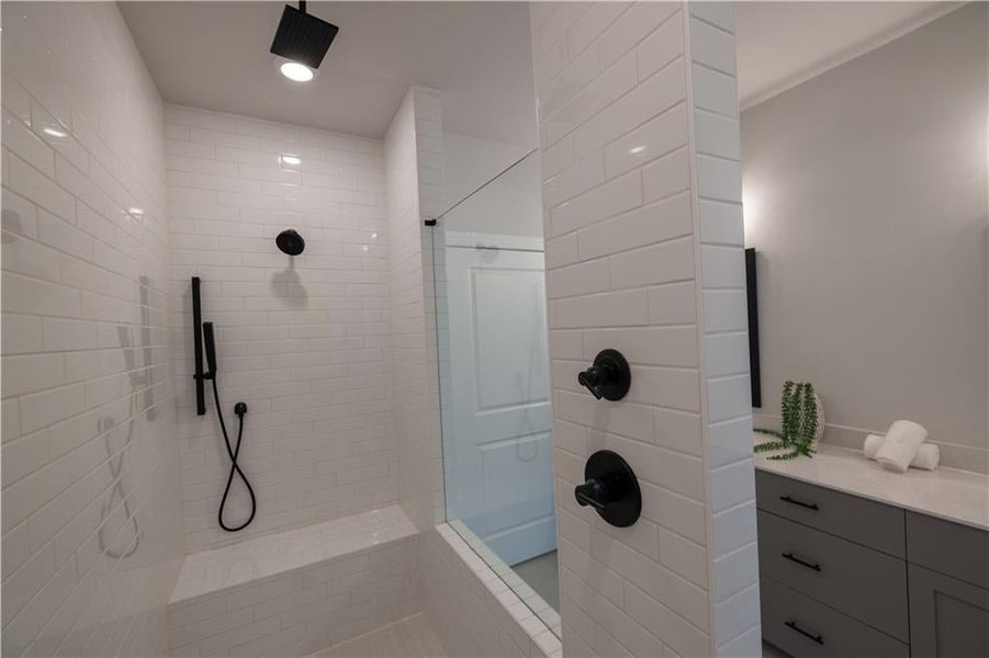 This shower includes three shower heads. *Please note that pictures shown are of the Jacobsen II floorplan but they are not of the actual home listed.