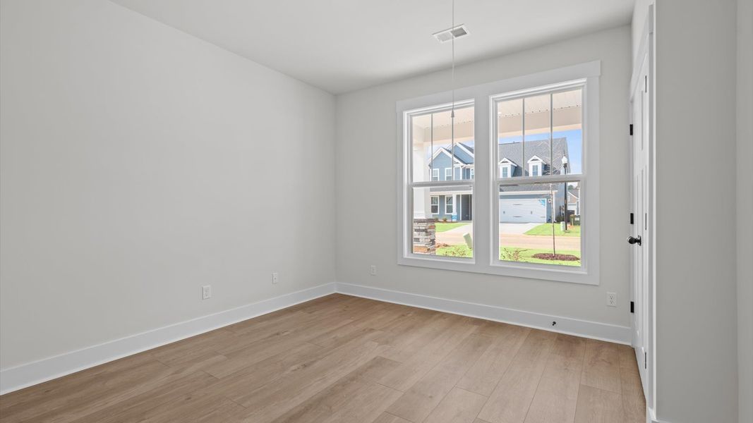 Desirable hardwood flooring in all bedrooms creates a cohesive and elegant interior