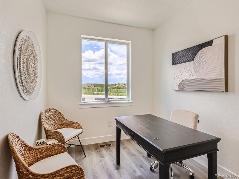 Furnished interior view inside a new home in Elevations at Murphy Creek, Aurora (Image 6).