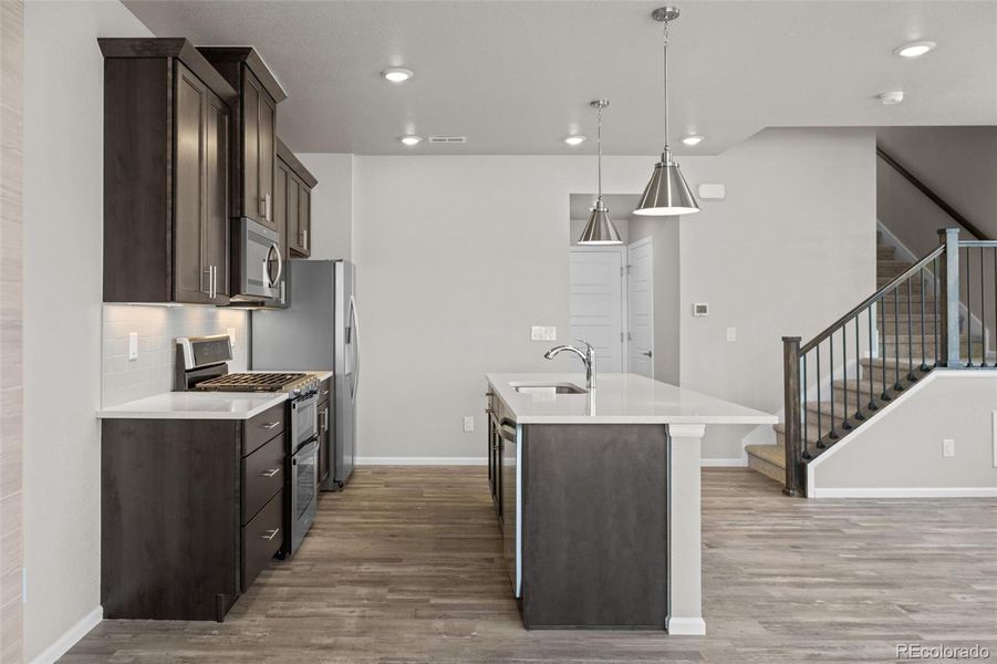 Furnished interior view inside a new home in Ralston Creek, Arvada (Image 4).