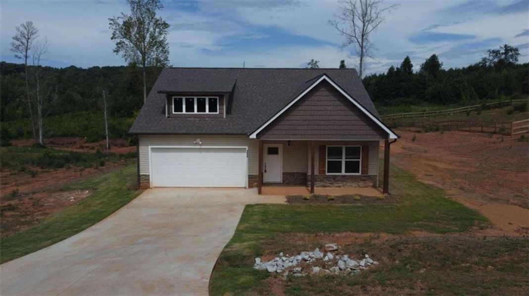 Front exterior of a new home in , Eastanollee, GA, highlighting curb appeal (Image 16). Front exterior of a new home in , Eastanollee, GA, highlighting curb appeal (Image 16).