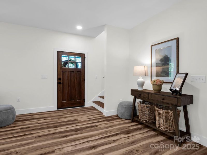 Looking at the front door from inside the home