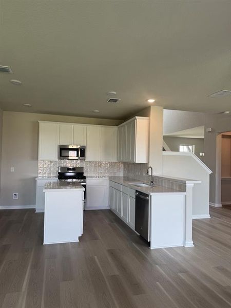 Furnished interior view inside a new home in Briarwood, Elgin (Image 5).