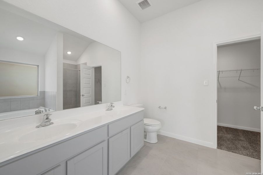 Furnished interior view inside a new home in Paloma Park, Converse (Image 11).