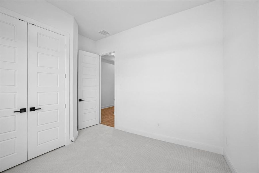 Spacious, unfurnished interior of a new home in Pecan Square - Gardens, Northlake (Image 29). Spacious, unfurnished interior of a new home in Pecan Square - Gardens, Northlake (Image 29).