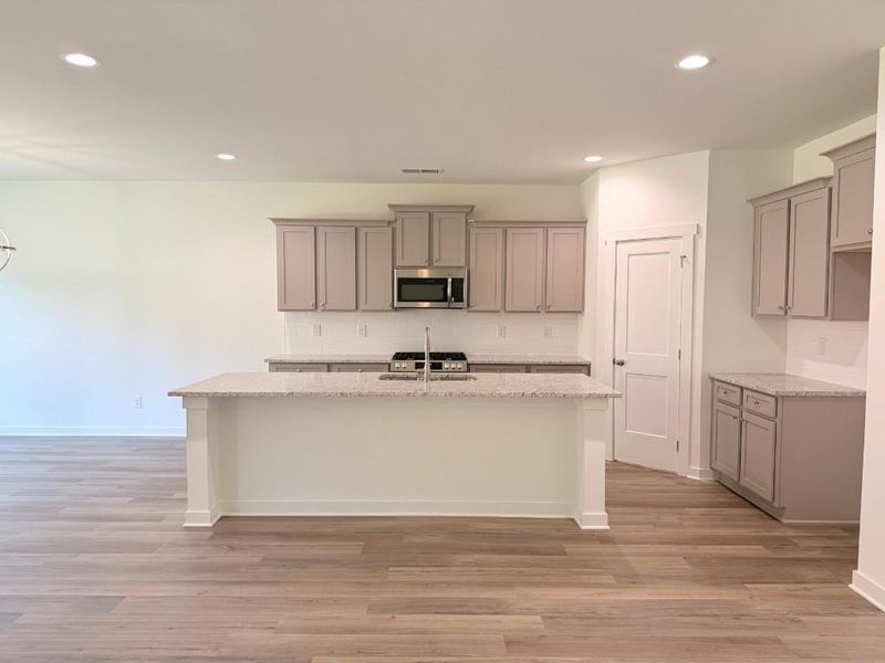 Furnished interior view inside a new home in Sutton’s Landing, Statham (Image 7).