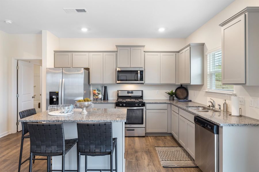 Representative furnished interior of a home built from the Mansfield by D.R. Horton in Sweet Briar, Ooltewah (Image 10).
