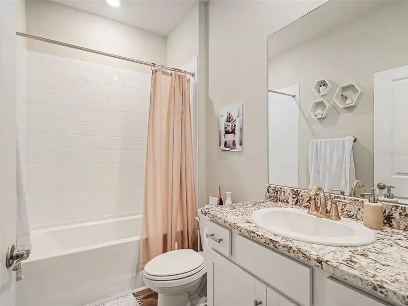 Furnished interior view inside a new home in Star Farms at Lakewood Ranch, Bradenton (Image 9).