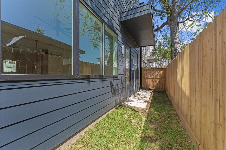 Exterior details and patio area of a home in , Houston (Image 29). Exterior details and patio area of a home in , Houston (Image 29).