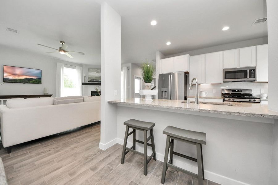 Sample photo of completed home with similar floor plan. Actual colors and selections may vary.