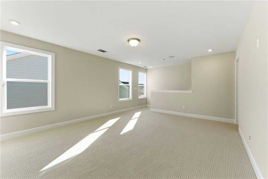 Spacious, unfurnished interior of a new home in Cresswind Georgia at Twin Lakes, Hoschton (Image 21).