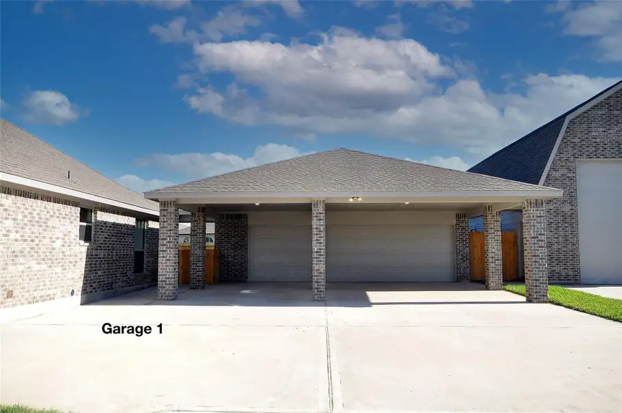 Front exterior of a new home in Pedregal, League City, TX, highlighting curb appeal (Image 22).