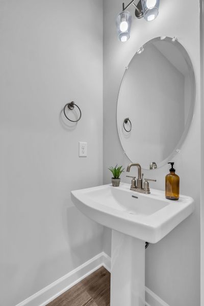 Stylish Powder Room in The Harrington Townhome