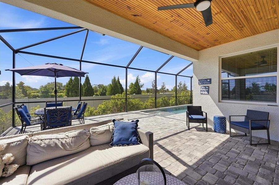 Exterior details and patio area of a home in Bella Lago, Parrish (Image 21).