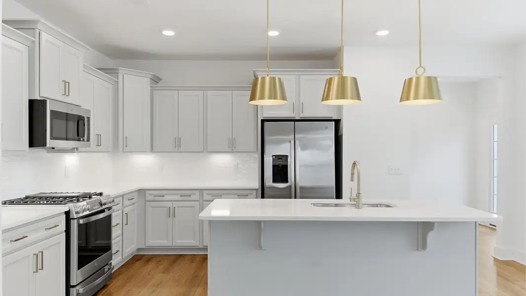 Furnished interior view inside a new home in Village at Midway, Anderson (Image 11).