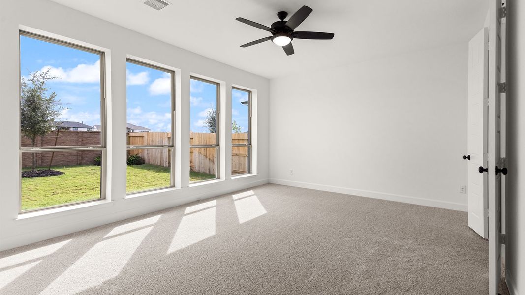 Spacious, unfurnished interior of a new home in Lakes of Cane Island, Katy (Image 11).