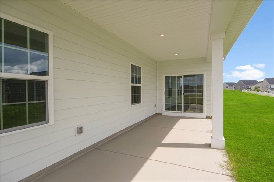 Exterior details and patio area of a home in Berkeley, Spartanburg (Image 18).