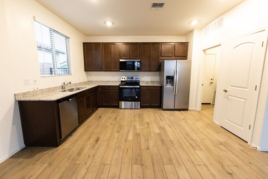 Furnished interior view inside a new home in Entrada Del Pueblo at Rancho Sahuarita, Sahuarita (Image 4).