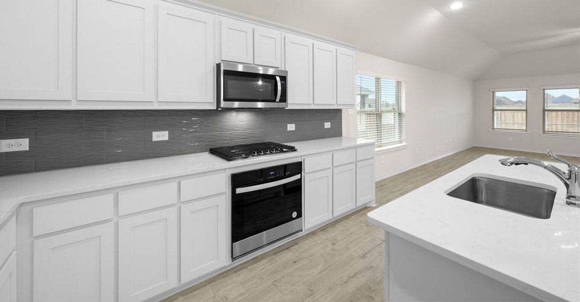 Representative exterior photo of a completed home built from the Salinas by Impression Homes in Redden Farms, Midlothian, TX (Image 10). Representative exterior photo of a completed home built from the Salinas by Impression Homes in Redden Farms, Midlothian, TX (Image 10).