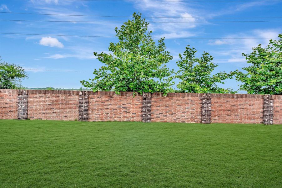 Exterior details and patio area of a home in Oakwood Estates, Waller (Image 27).