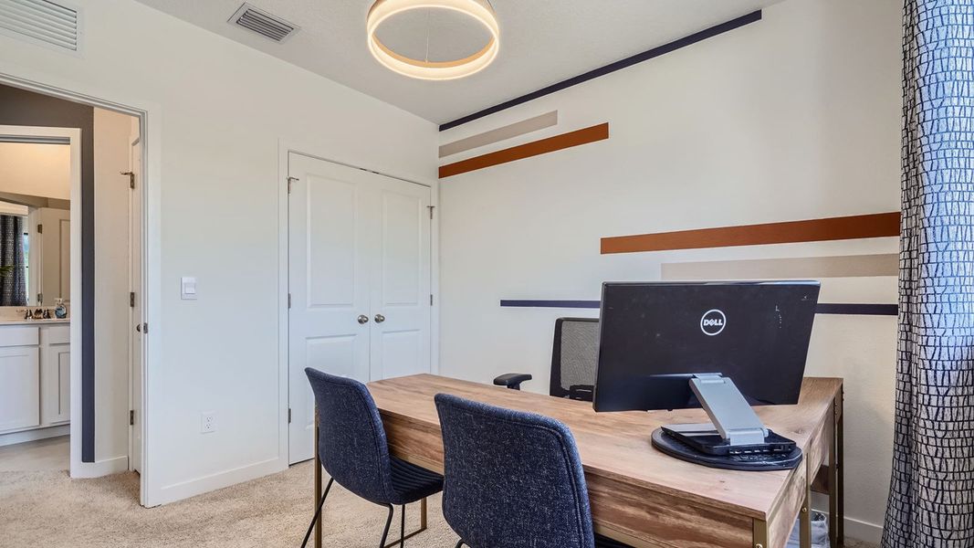 Representative furnished interior of a home built from the Topaz by D.R. Horton in Ashwood Cove, Lake Worth (Image 32).