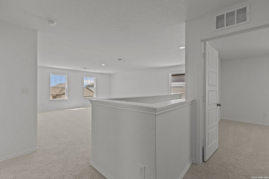 Spacious, unfurnished interior of a new home in Davis Ranch, San Antonio (Image 14).