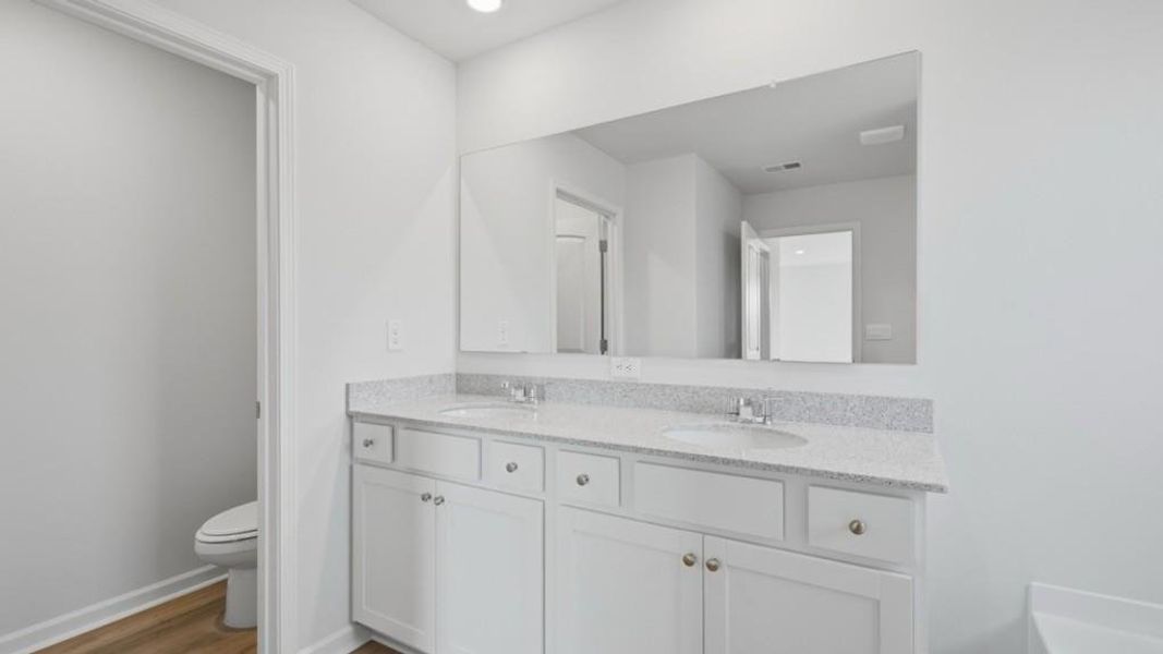 Furnished interior view inside a new home in Fairway 17 at Mirror Lake, Villa Rica (Image 4).