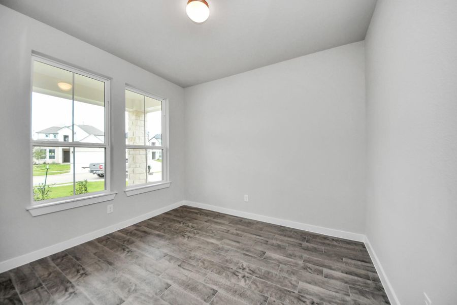 Step into the inviting home office, where elegant tile flooring adds a touch of freshness and comfort to the workspace. Natural light pours through the window, creating an inspiring environment for productivity and focus. Step into the inviting home office, where elegant tile flooring adds a touch of freshness and comfort to the workspace. Natural light pours through the window, creating an inspiring environment for productivity and focus.