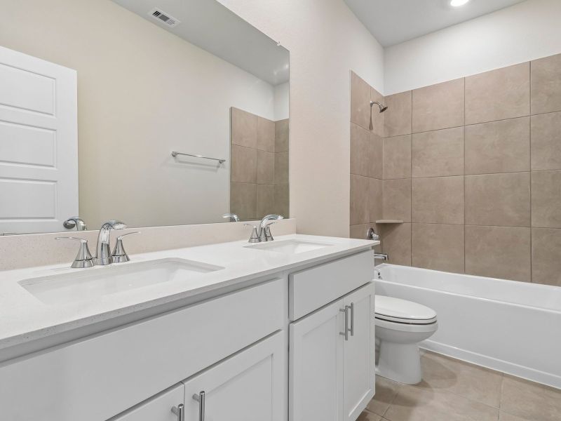 Furnished interior view inside a new home in Riviera Pines - Premier Series, Huffman (Image 8).