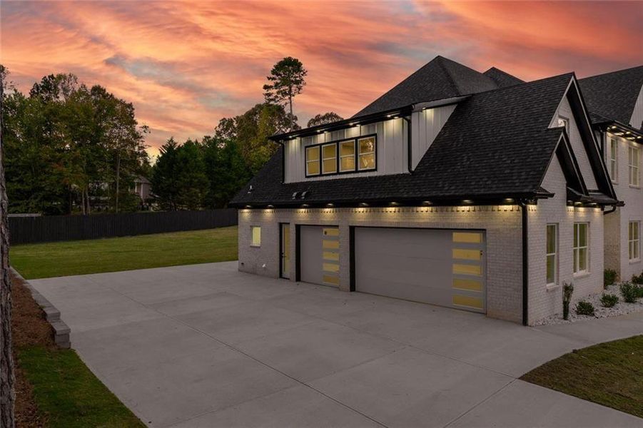 Front exterior of a new home in , Loganville, GA, highlighting curb appeal (Image 35).