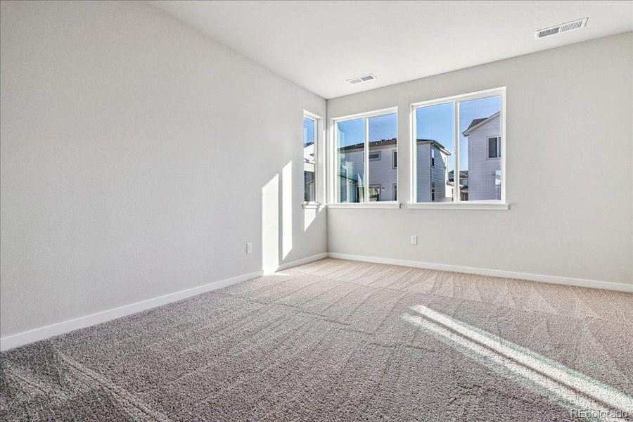 Spacious, unfurnished interior of a new home in Floret Collection at Alder Creek, Parker (Image 10).