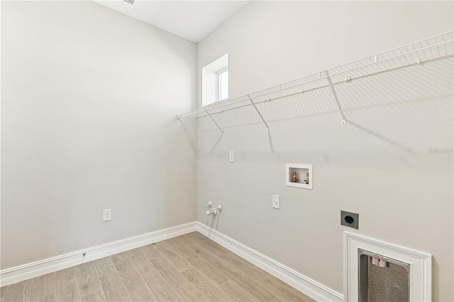 Spacious, unfurnished interior of a new home in Coral Lakes - Tradition & Express, Punta Gorda (Image 20).