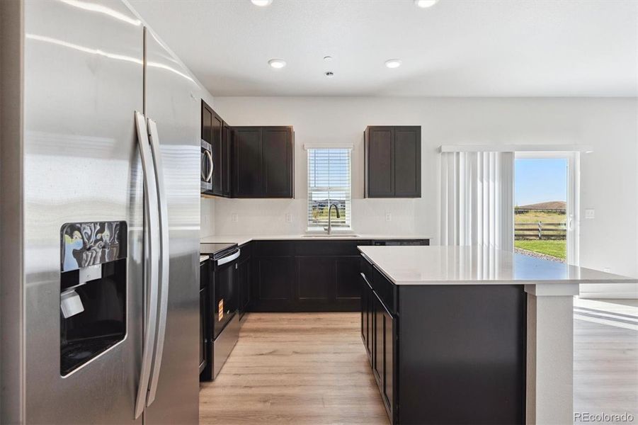 Furnished interior view inside a new home in Legato, Commerce City (Image 9).